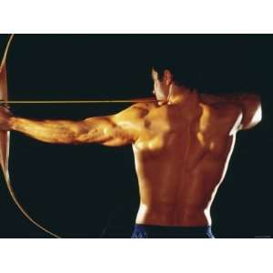  Strong Muscular Man Pulling Back on Bow and Arrow 