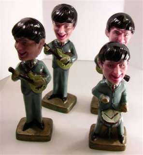 Set of 4 plastic vintage Beatles bobbleheads are marked Made In Hong 