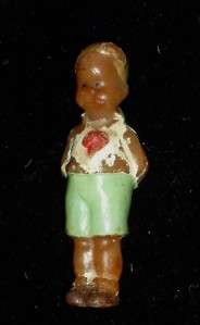   following auction is for an Antique Wax Doll of Skeezix Cartoon Figure