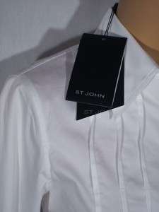 measurements will stretch. new, never worn. st. john label and/or hang 