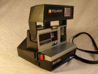 Polaroid Sun 600 Instant Film Camera Includes Neck Strap  