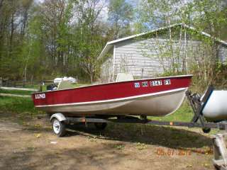 fishing boat, motor and trailer 1975 Lund 16 ft aluminum fishing boat 