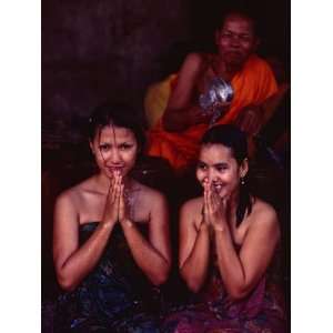  Monk Blessing Two Women at Angkor Wat, Angkor, Cambodia 