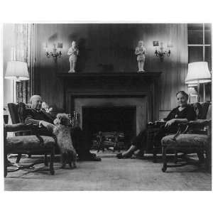 Eugene and Agnes Meyer at home seated by fireplace