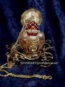   Empress Alexandra golden Coach Egg with matching Egg Pendant necklace