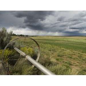  Farm Irrigation Sprinklers Next to a Hay Field in Western 